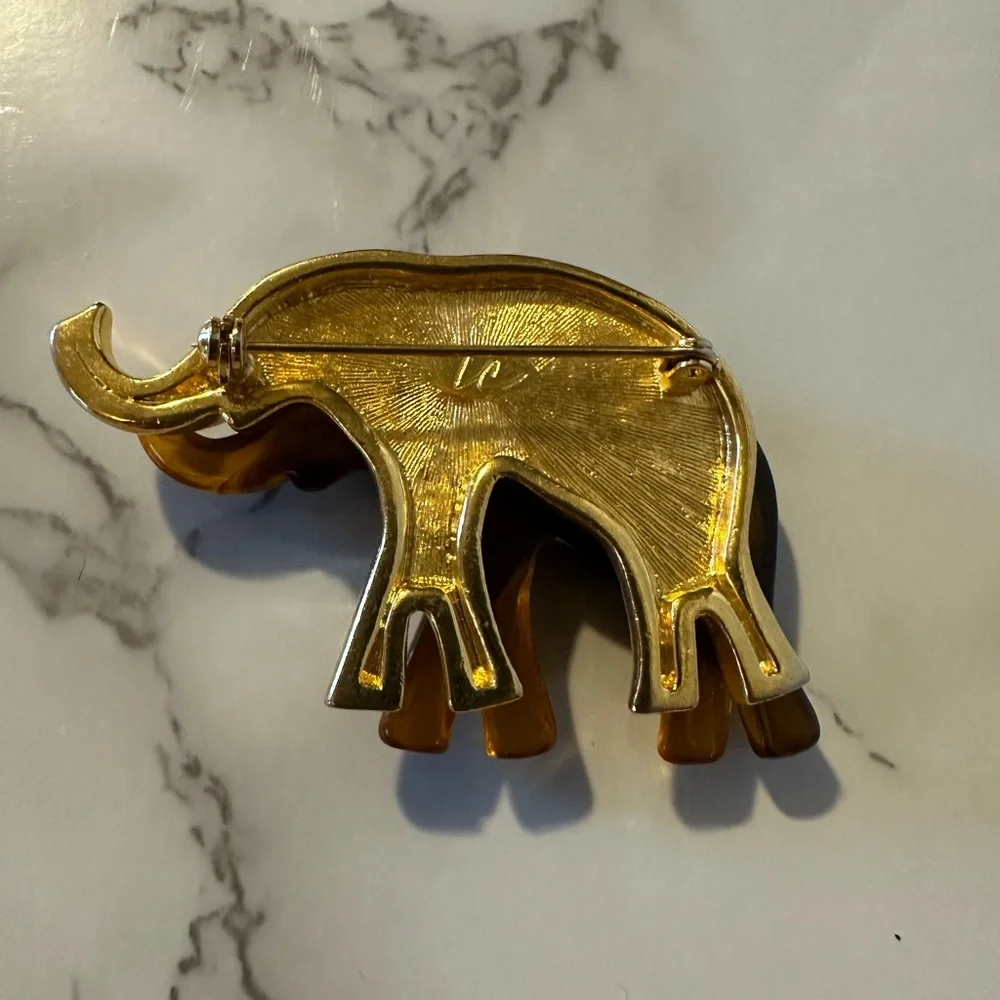 Liz Claiborne faux tortoise‎ and gold tone elephant brooch